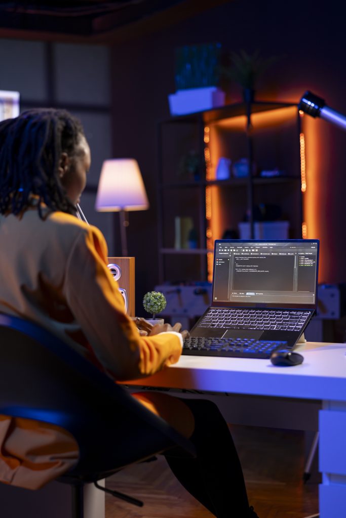 Web designer working late on client project